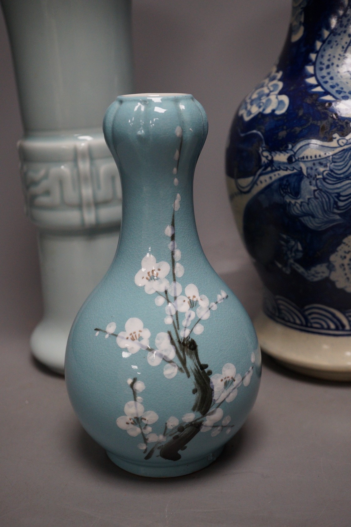 A Chinese blue and white vase, two jars, a beaker vase, a double gourd vase and a pearlware vase, tallest 31cm